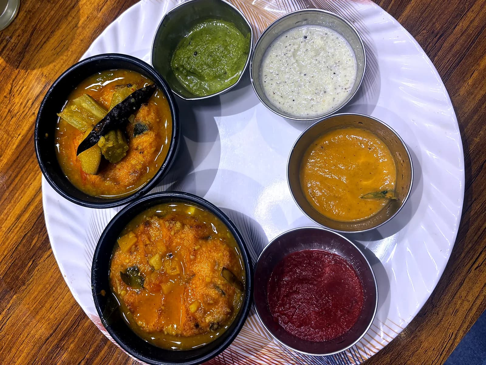 Our four chutneys in steel bowls